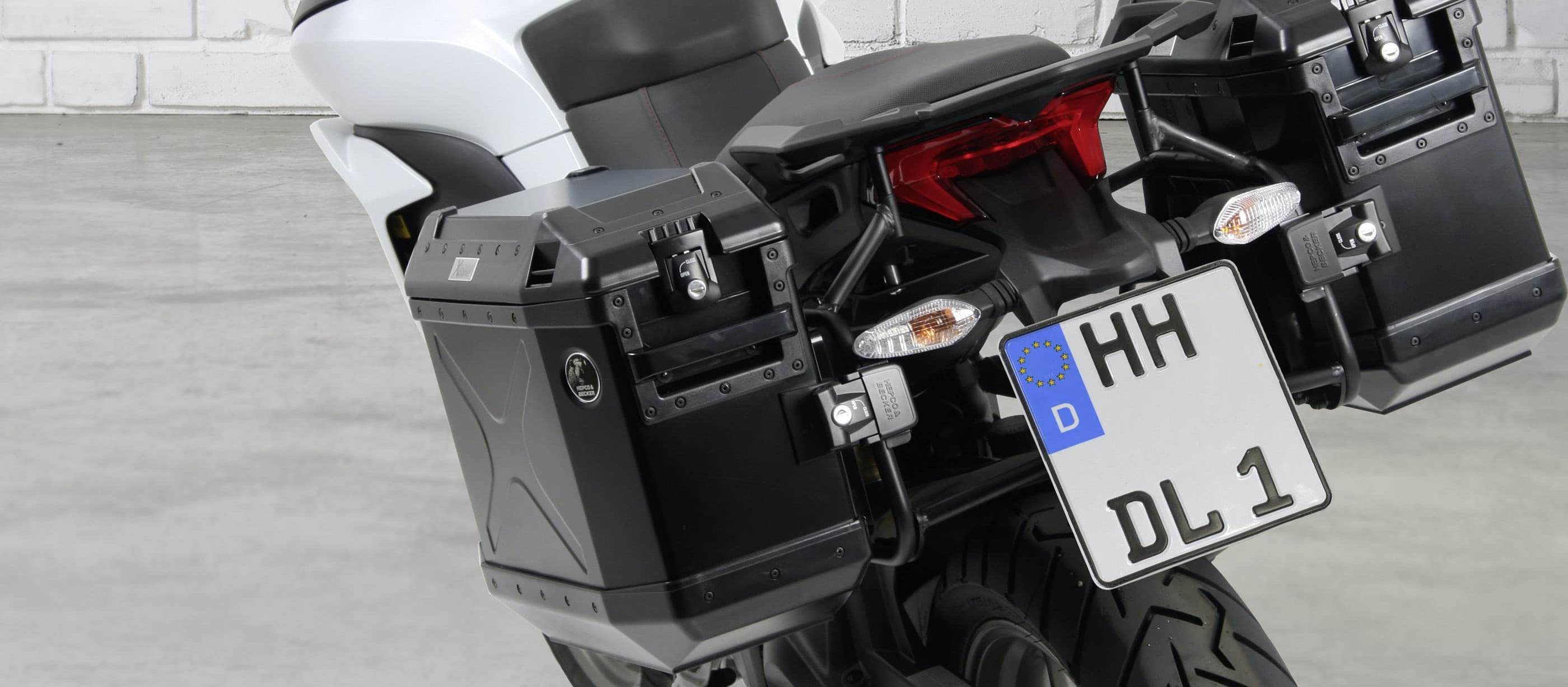 Installing a case and rack system on a motorcycle