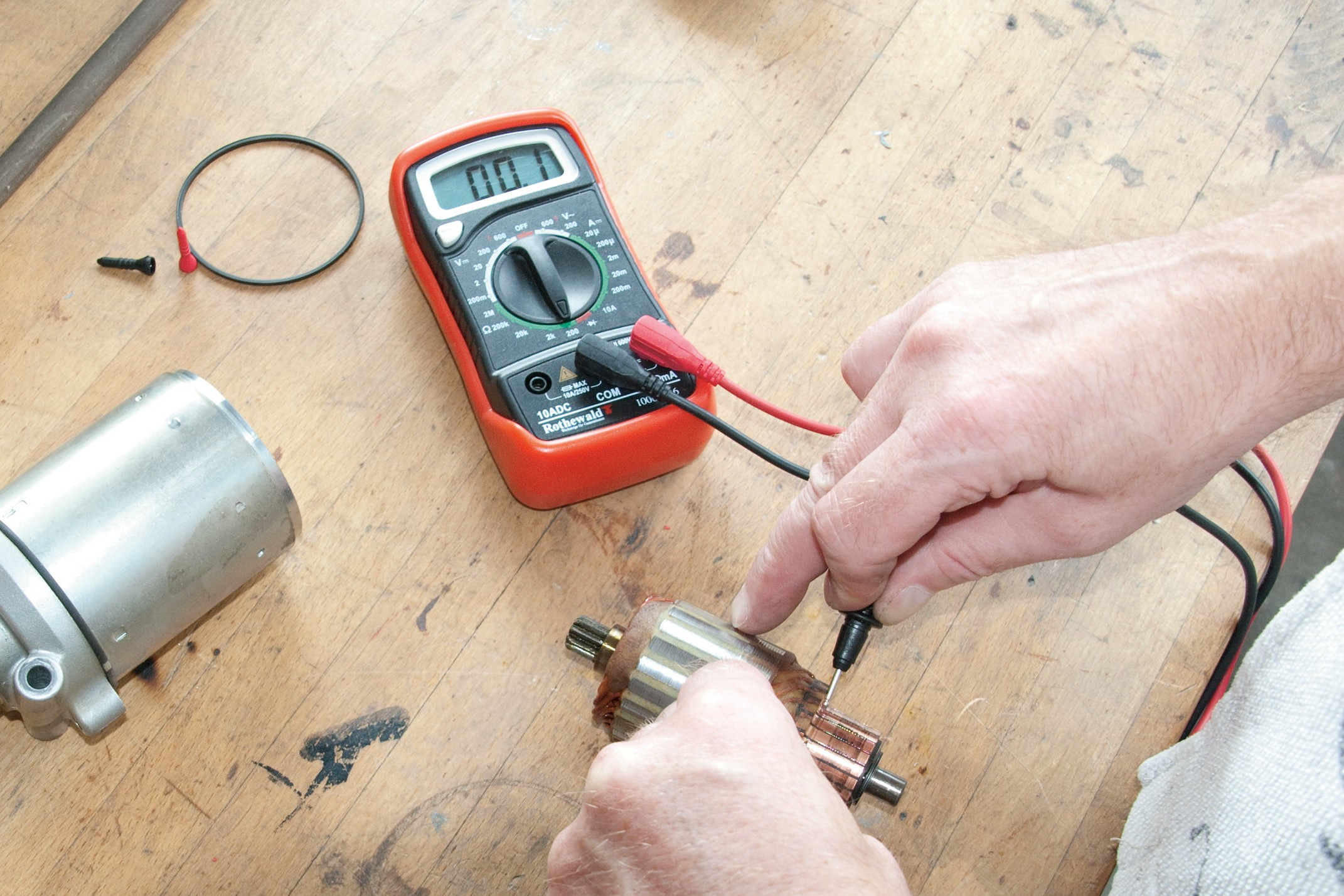 Step 2, Fig. 4: Continuity test between commutator grooves...