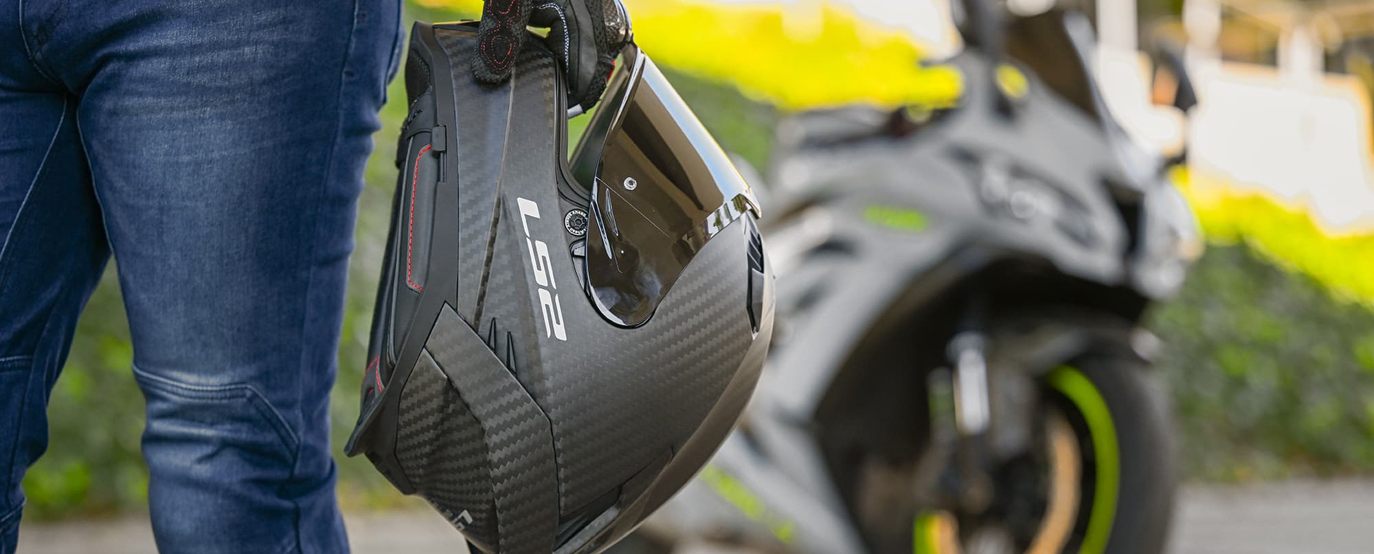 Motorcycle helmet in front of a motorcycle