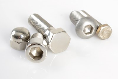 Stainless-steel screws and cap nuts look even better when polished (left in the picture)